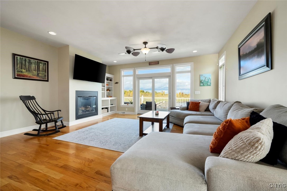 203 Marine View Drive Sullivan, NY 13037 - Photo 8 of 41 Living room with gas fireplace and doors to deck