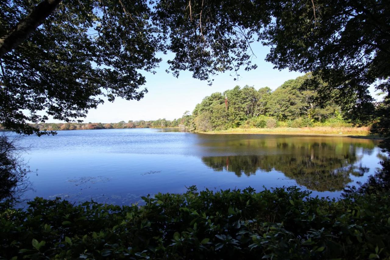 817 Old Strawberry Hill Road, Unit 3B Centerville, MA 02632 - Photo 9 of 9 a view of a lake from a yard