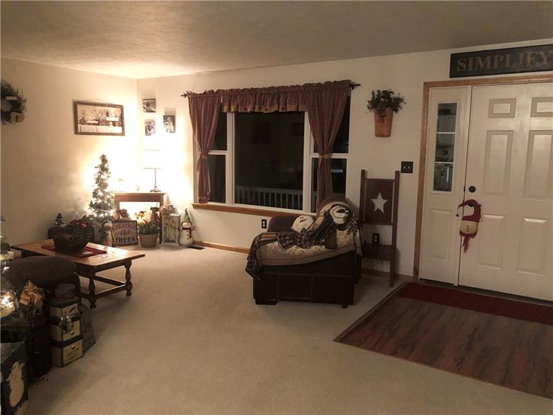 4239 Warren Road Indiana, PA 15701 - Photo 11 of 19 MAIN LIVING ROOM WITH CUTE FRONT PORCH AND CLOSET FOR COATS