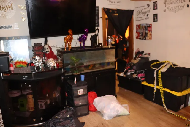 a kitchen with a sink a stove and a microwave