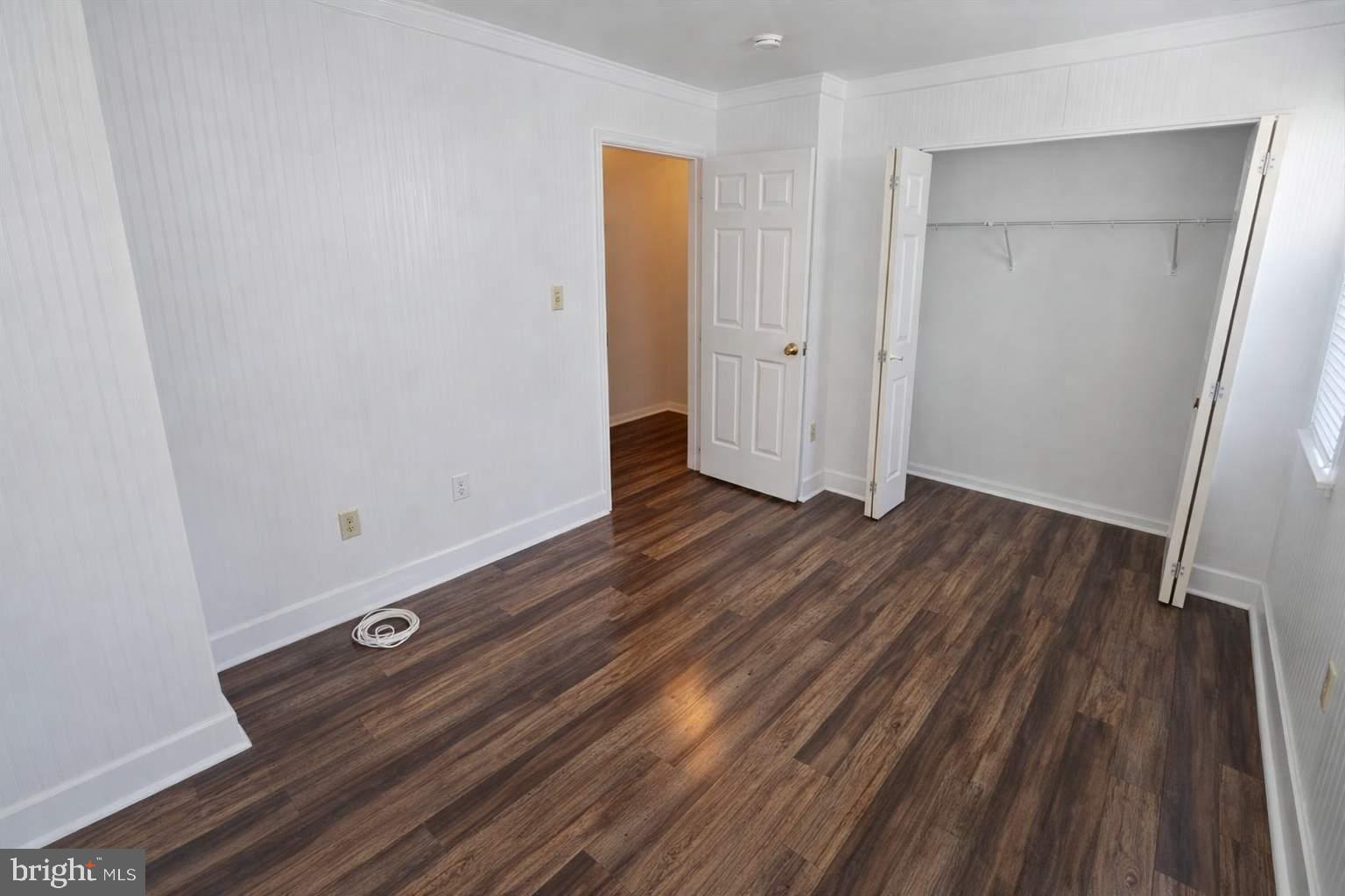 43 Bank Spring Court Owings Mills, MD 21117 - Photo 14 of 20 a view of empty room with wooden floor