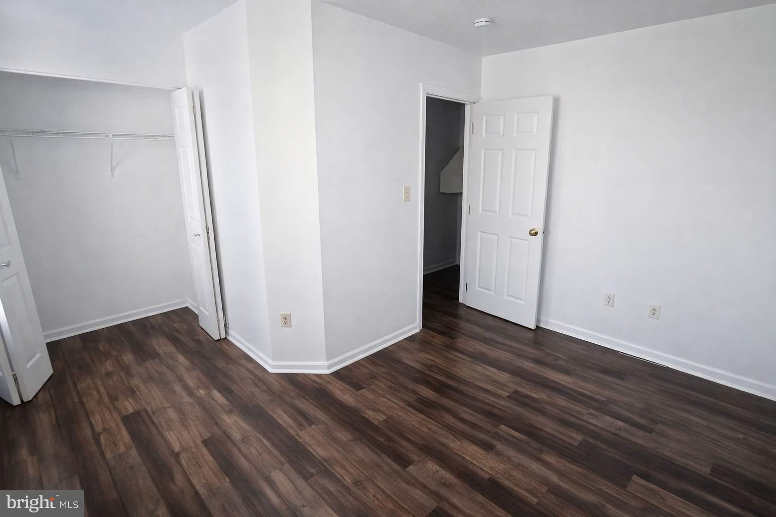 43 Bank Spring Court Owings Mills, MD 21117 - Photo 10 of 20 a view of a room with wooden floor