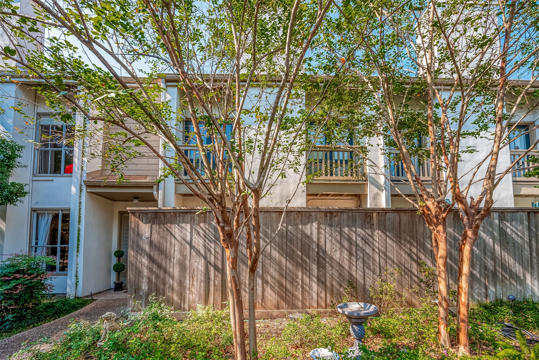 2100 Tanglewilde Street, Unit 189 Houston, TX 77063 - Photo 3 of 31 Brand New Roof (April 2025) with extra large private patio with new fence