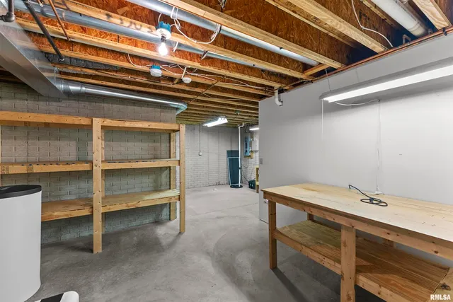 a utility room with cabinets