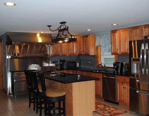 1112 West Road Waterboro, ME 04087 - Photo 6 of 25 Kitchen. Gleaming granite and...