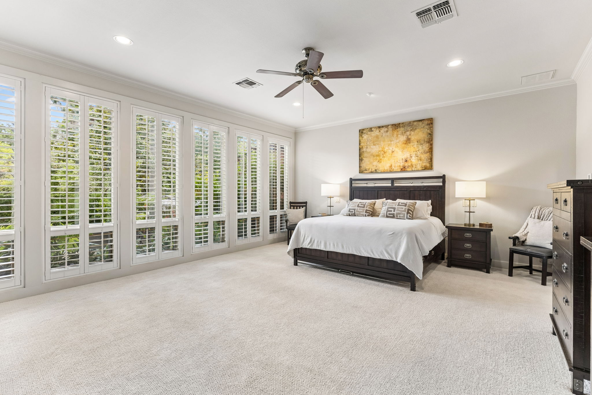 1807 Terminal Loop Road McQueeney, TX 78123 - Photo 22 of 40 Floor-to-ceiling plantation shutters offer beautiful views into the lush courtyard.