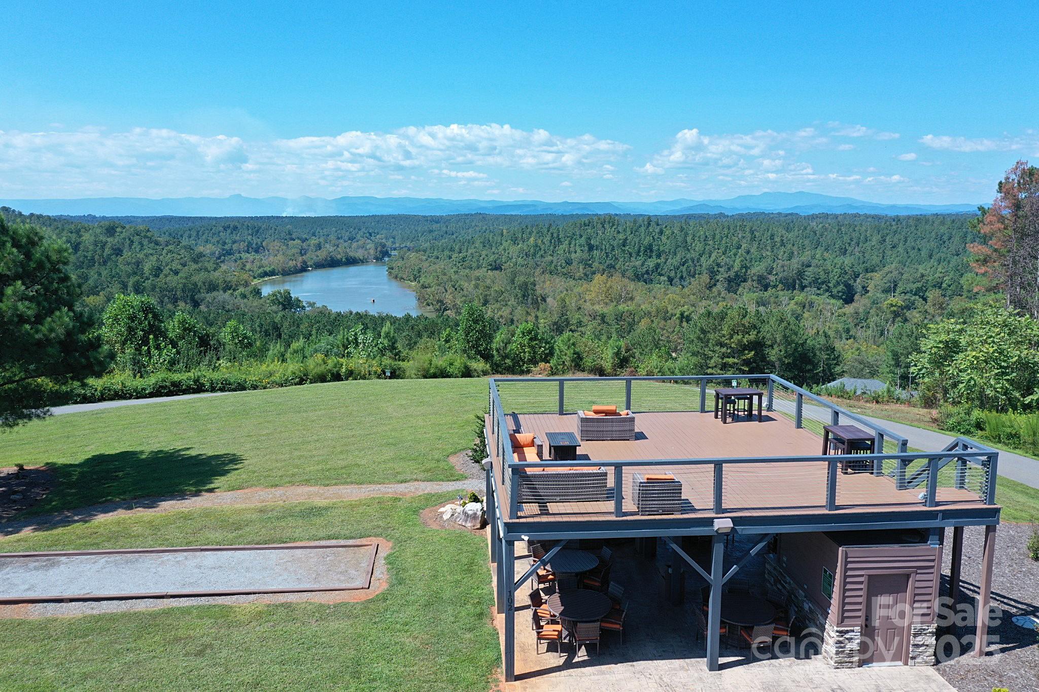 335 Table Rock Trace Northwest, Unit 154 Valdese, NC 28690 - Photo 14 of 25 an aerial view of a house with a big yard
