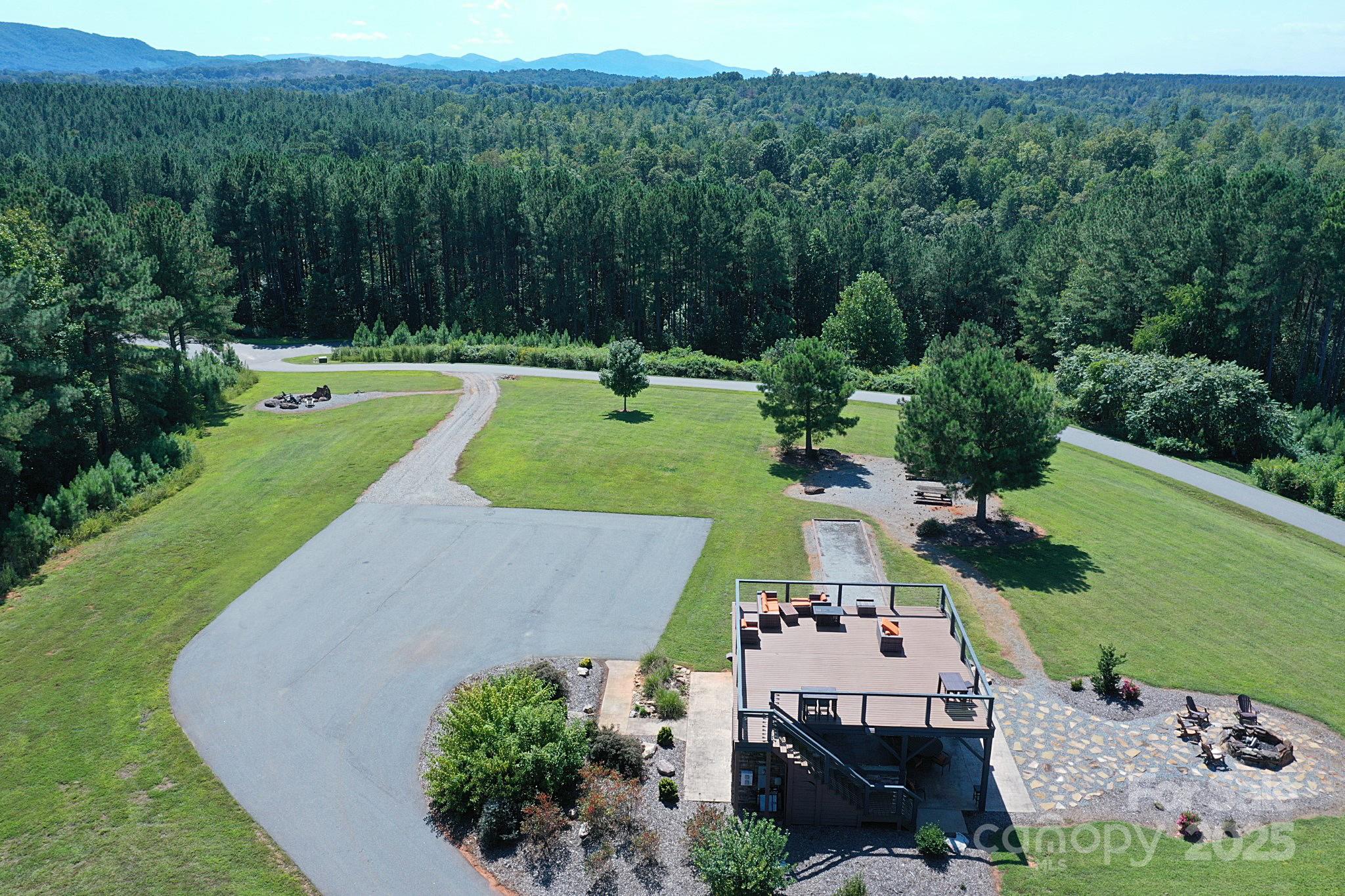 335 Table Rock Trace Northwest, Unit 154 Valdese, NC 28690 - Photo 15 of 25 an aerial view of a house with a yard