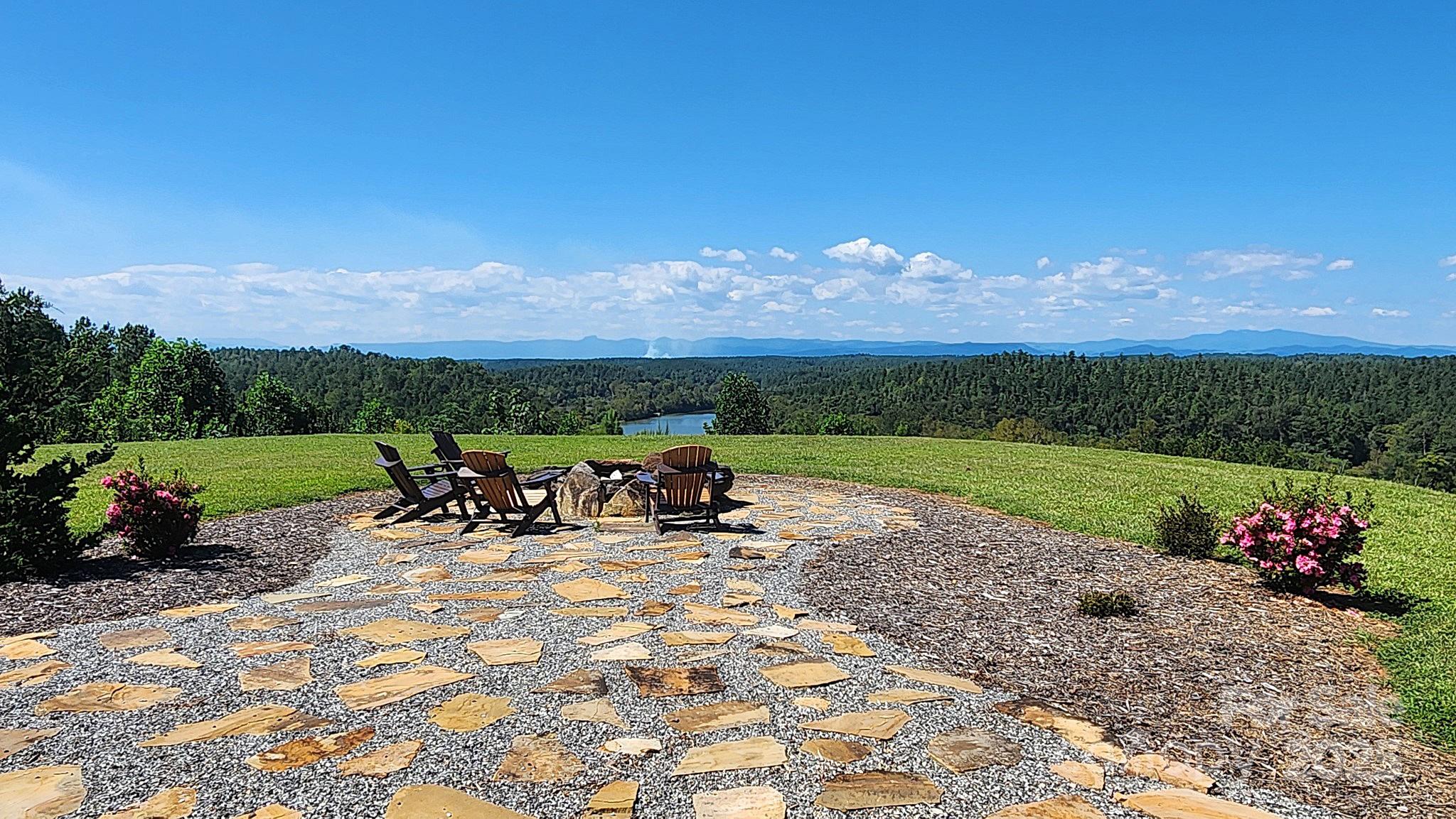 335 Table Rock Trace Northwest, Unit 154 Valdese, NC 28690 - Photo 24 of 25 a view of a outdoor space with furniture and garden