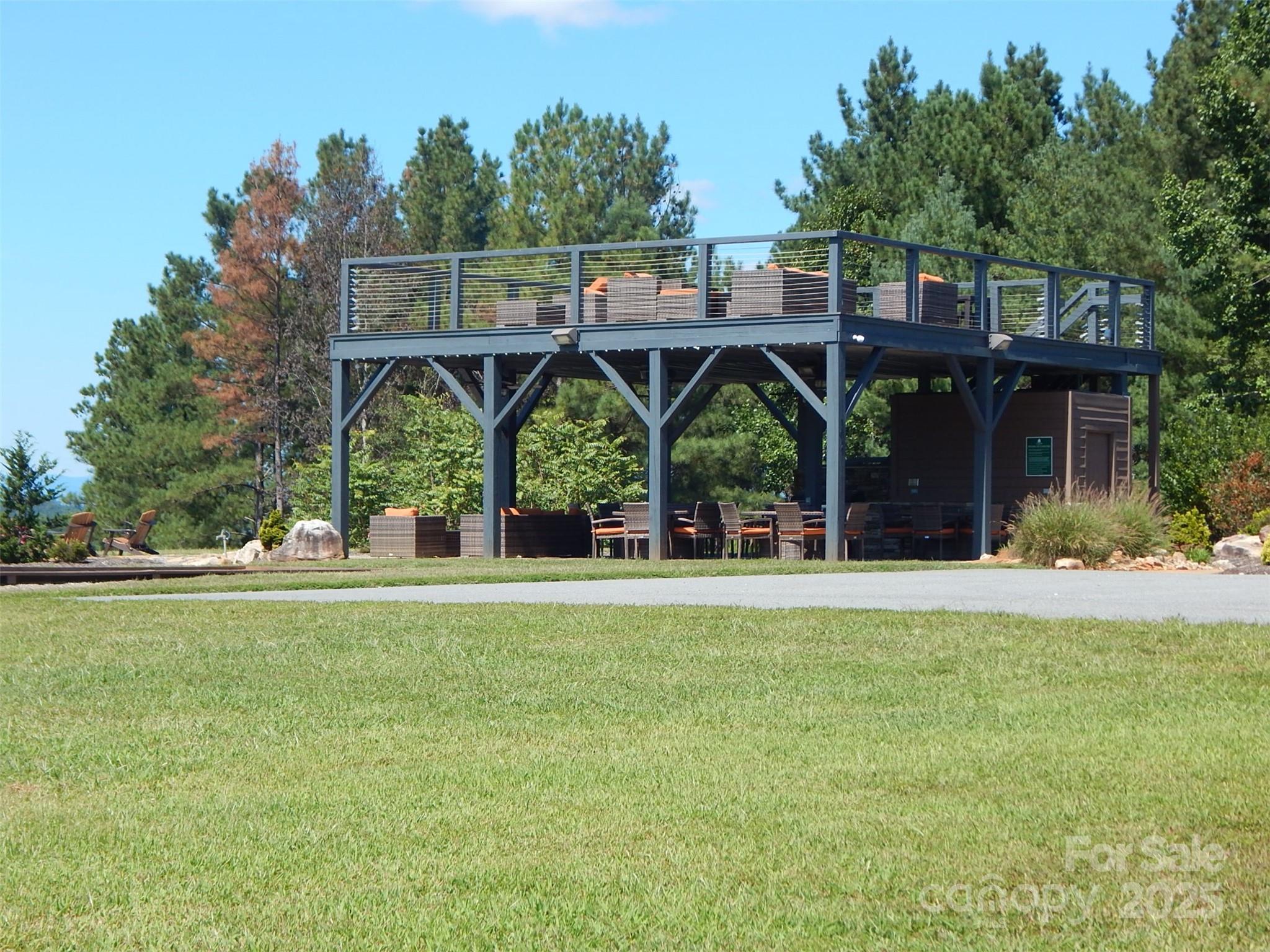 335 Table Rock Trace Northwest, Unit 154 Valdese, NC 28690 - Photo 3 of 25 a front view of a house with a garden