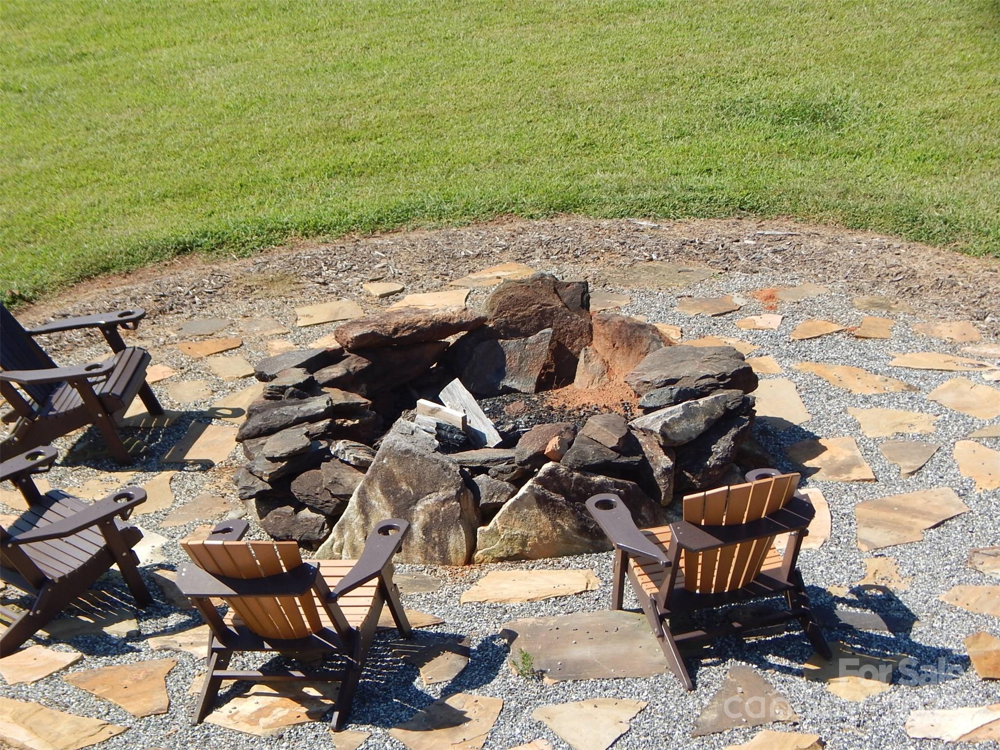 335 Table Rock Trace Northwest, Unit 154 Valdese, NC 28690 - Photo 9 of 25 a view of an outdoor space with seating area