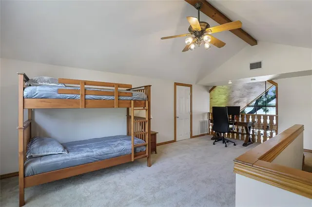 a living room with furniture a dining table and a piano table