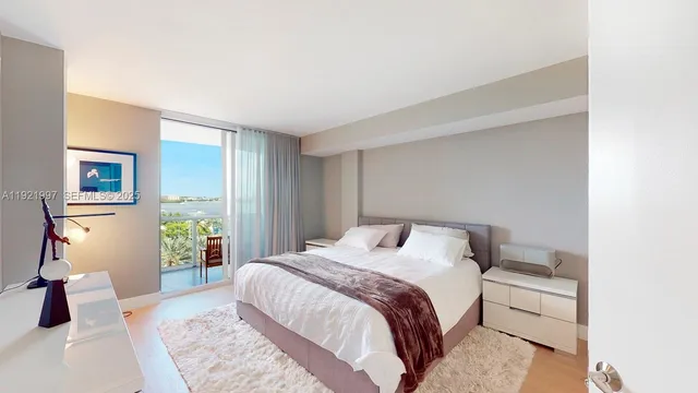 a bedroom with a bed and a couch