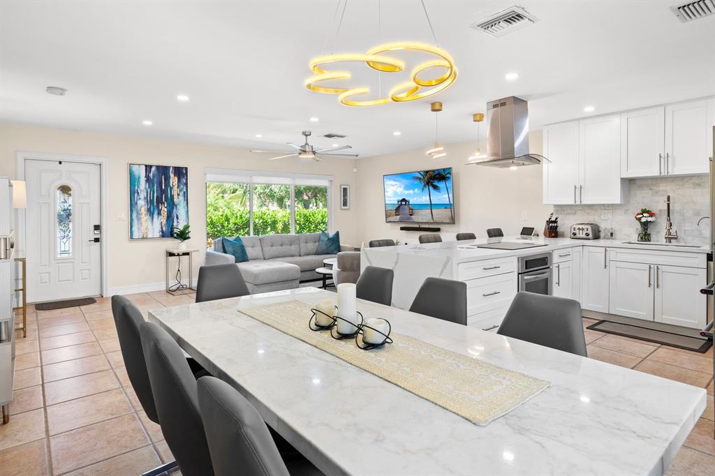 4804-4806 Northeast 21st Avenue Fort Lauderdale, FL 33308 - Photo 24 of 31 a large white kitchen with a large window
