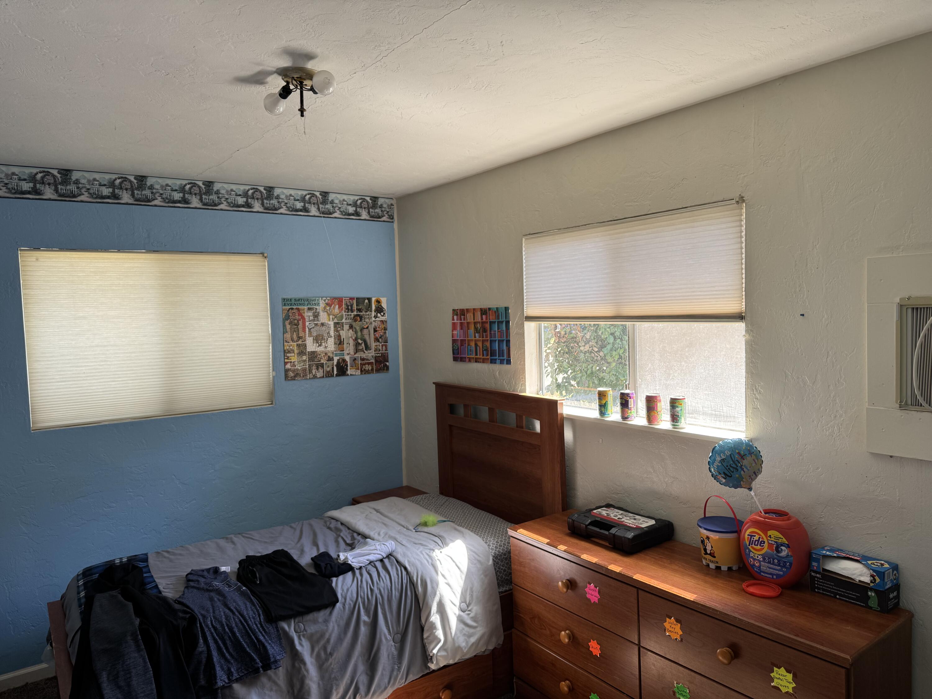 1015 Gold Street Redding, CA 96001 - Photo 9 of 17 a bedroom with a bed and a window