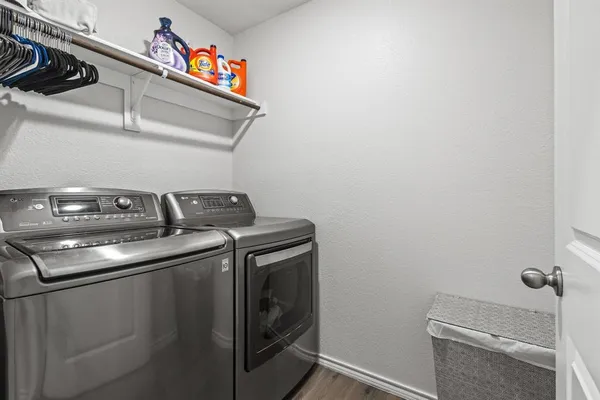 a utility room with dryer and washer