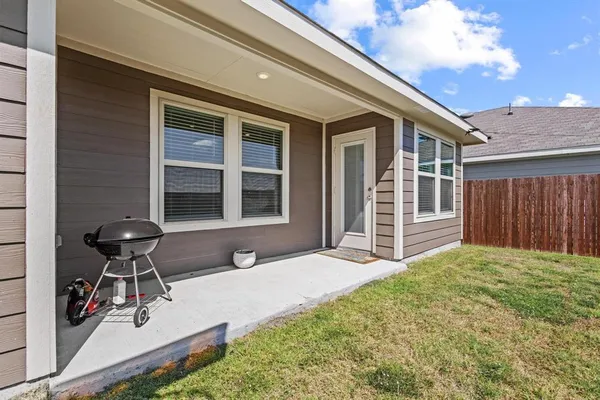 a house view with a garden space
