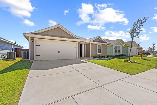 a view of house with yard and entertaining space