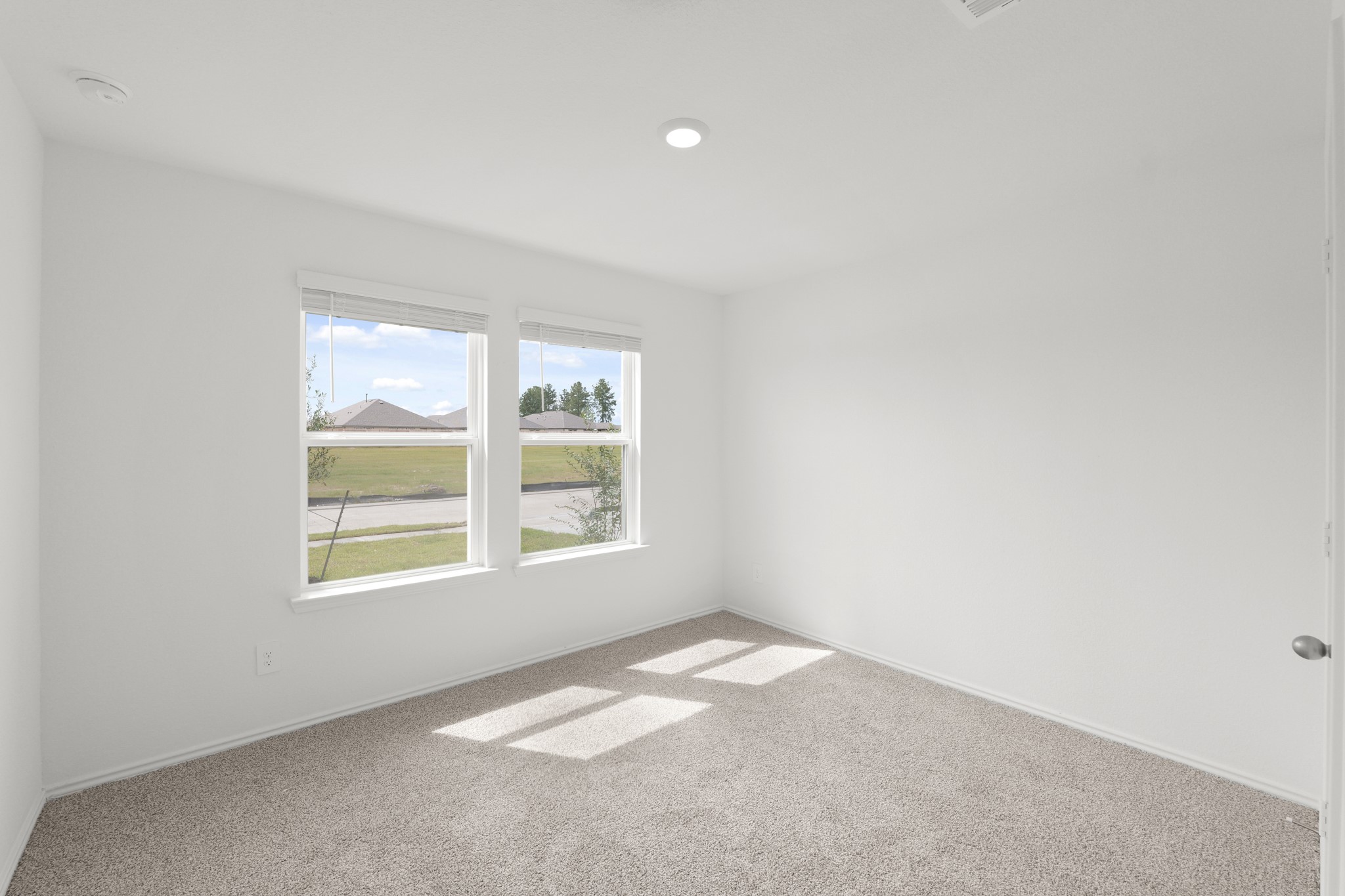14392 Oceanblue Way Splendora, TX 77372 - Photo 12 of 30 an empty room with a window