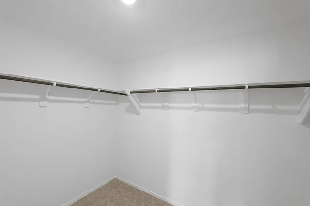 a view of a room with racks on the wall