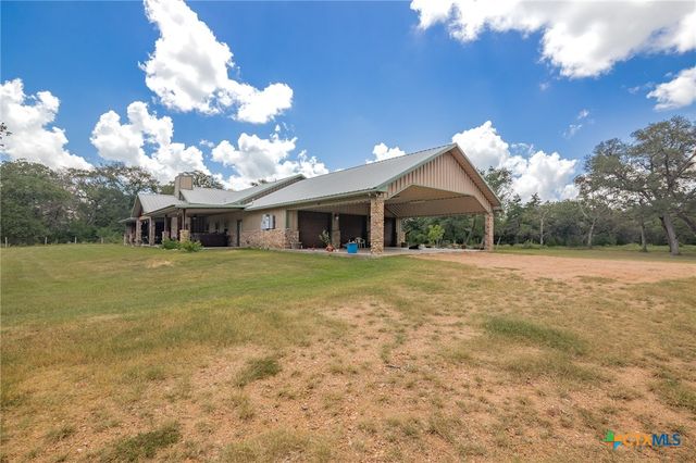 a view of house with garden