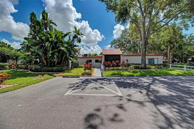 a view of a house with garden