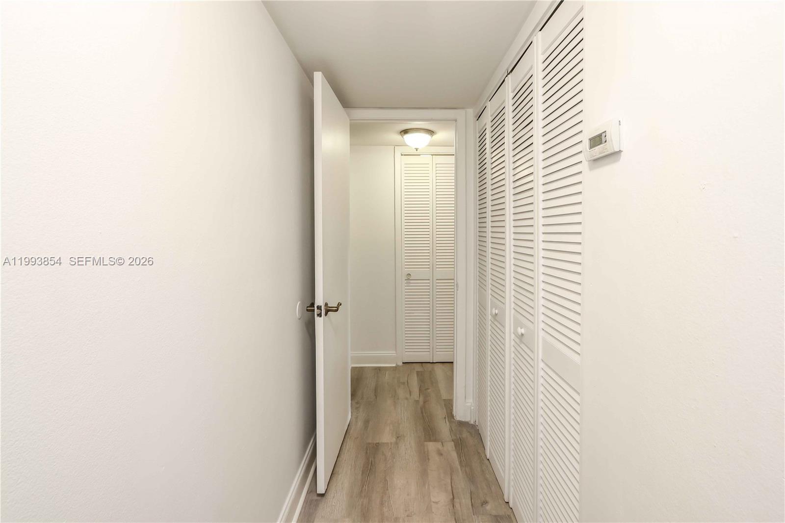 13785 Southwest 66th Street, Unit 239C Miami, FL 33183 - Photo 14 of 17 a view of a room with wooden floor