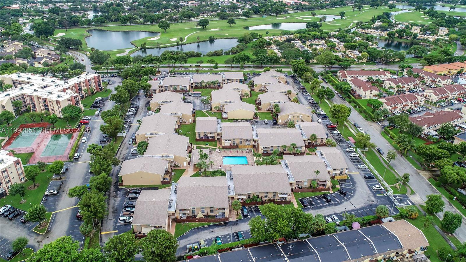13785 Southwest 66th Street, Unit 239C Miami, FL 33183 - Photo 4 of 17 an aerial view of a house with outdoor space and lake view