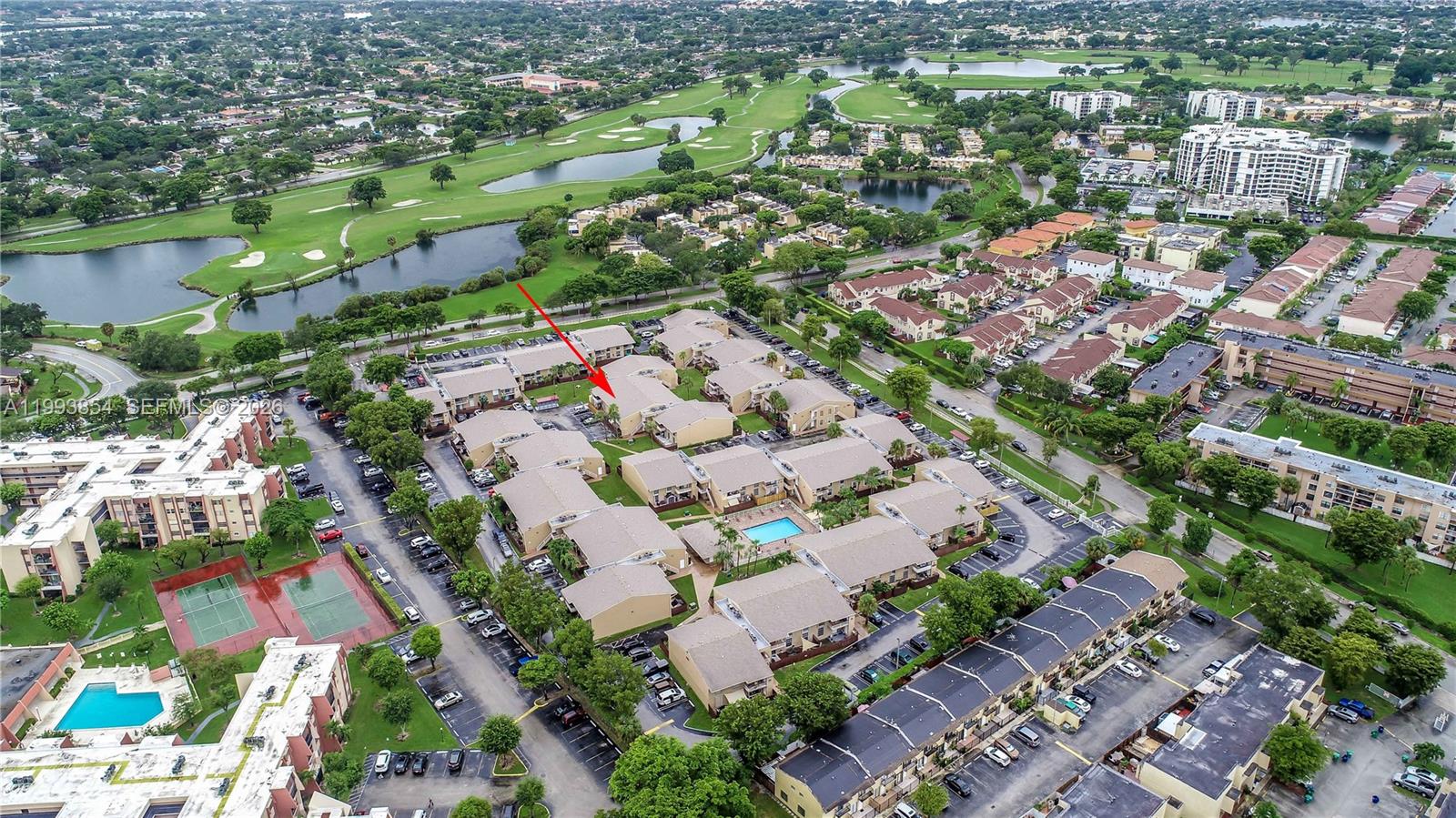 13785 Southwest 66th Street, Unit 239C Miami, FL 33183 - Photo 7 of 17 an aerial view of residential houses with outdoor space