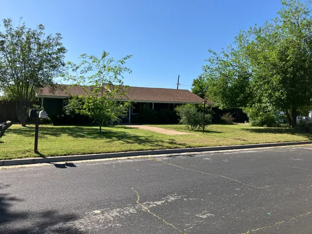 a view of a house with a big yard