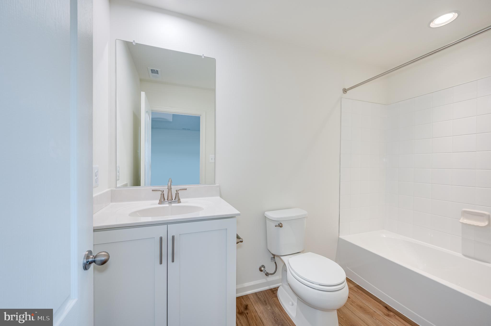 115 Tuxford Road Falling Waters, WV 25419 - Photo 15 of 44 a bathroom with a sink toilet and vanity