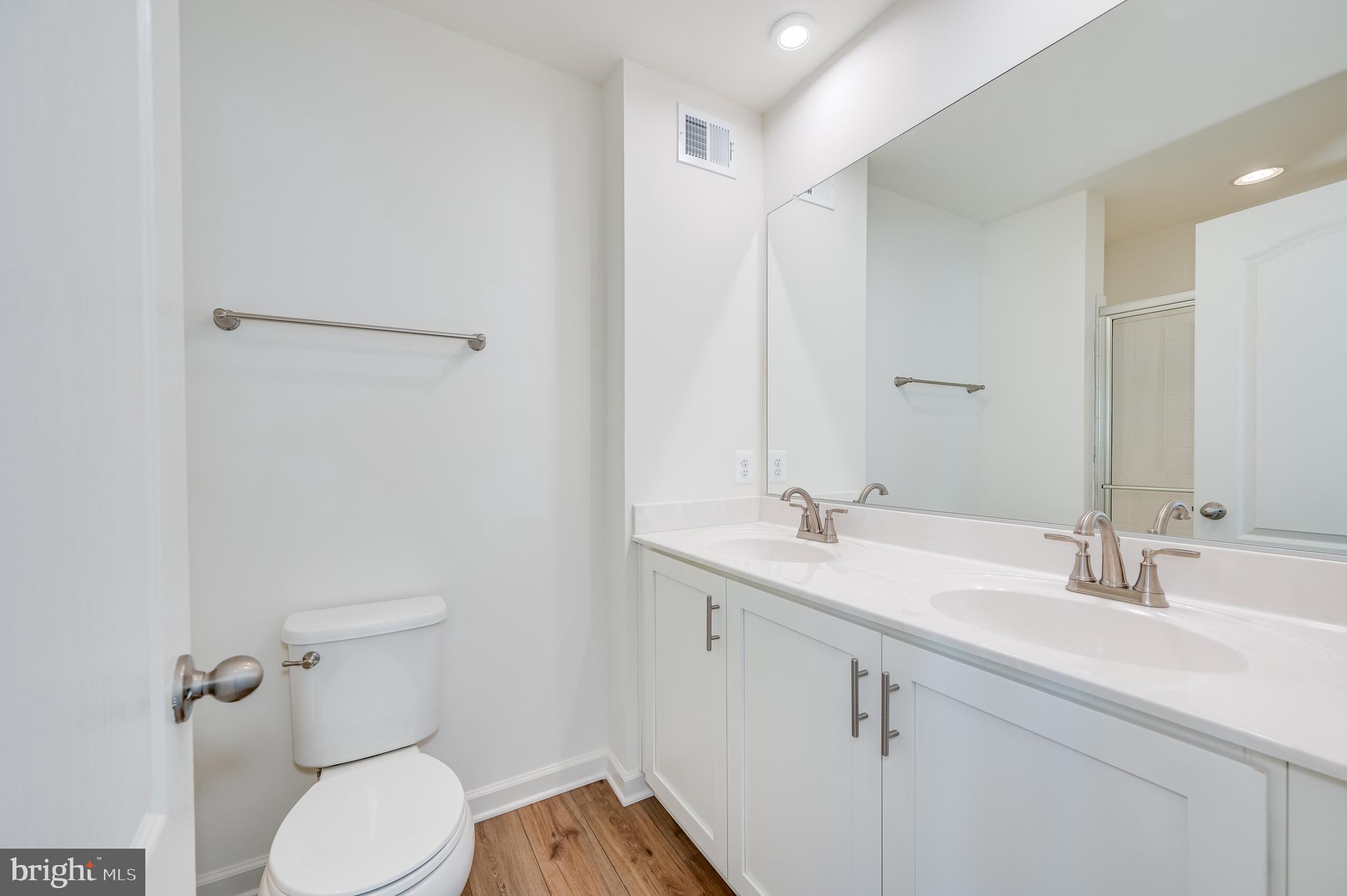 115 Tuxford Road Falling Waters, WV 25419 - Photo 34 of 44 a bathroom with a sink toilet and mirror