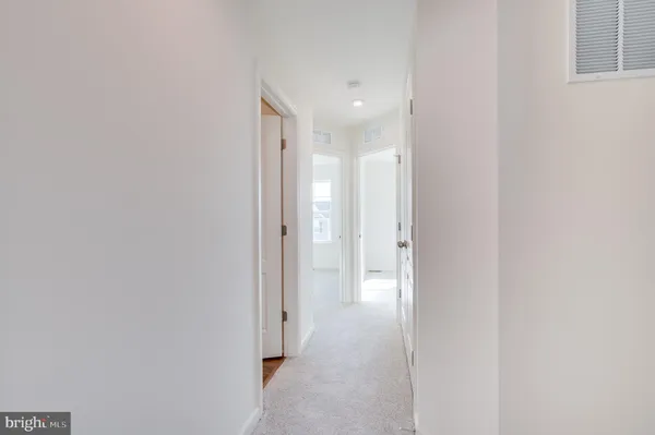 a bathroom with a sink toilet tub and shower