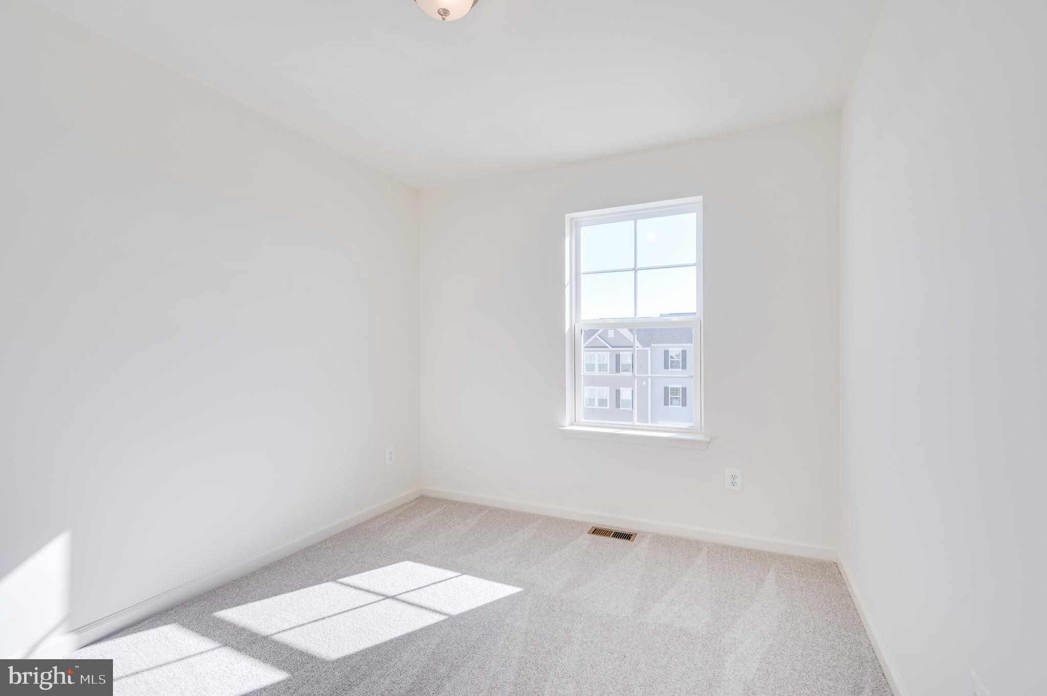 115 Tuxford Road Falling Waters, WV 25419 - Photo 38 of 44 an empty room with a window