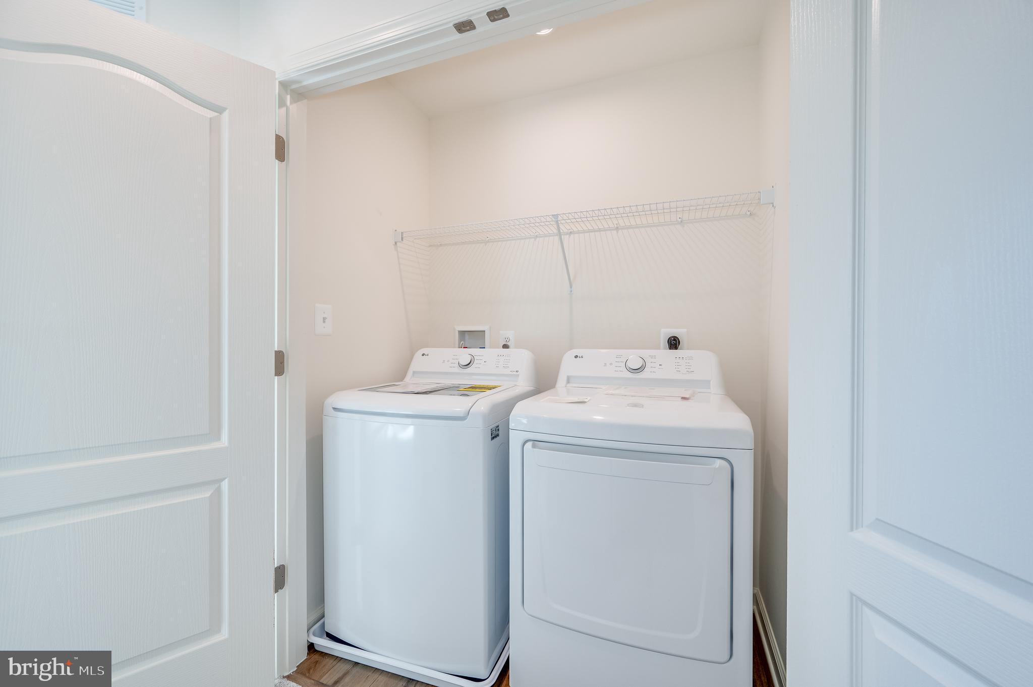 115 Tuxford Road Falling Waters, WV 25419 - Photo 42 of 44 a utility room with dryer and washer