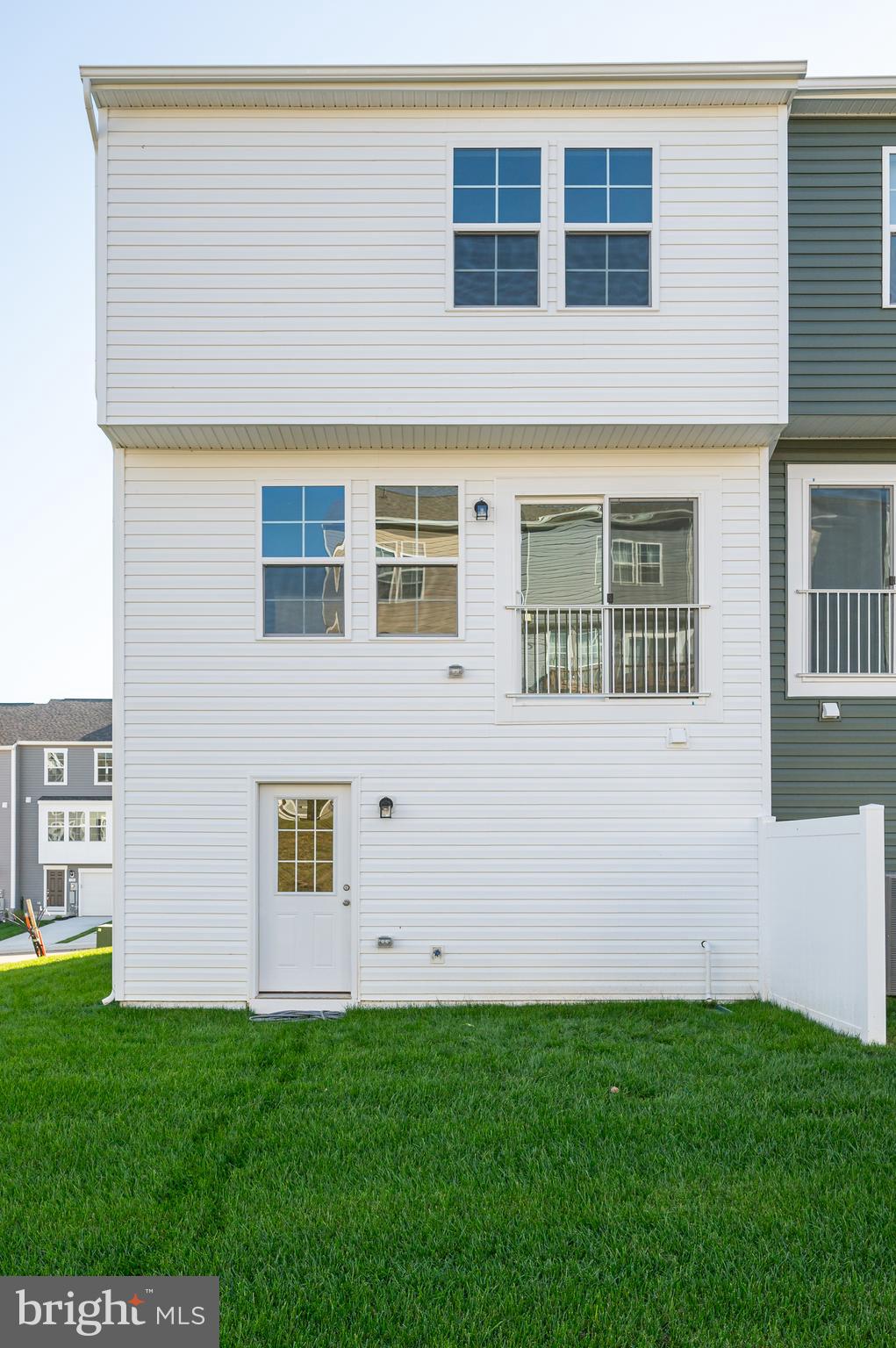 115 Tuxford Road Falling Waters, WV 25419 - Photo 7 of 44 a front view of a house with a yard