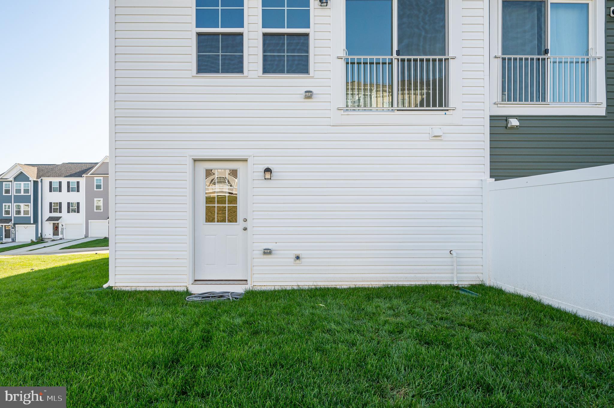 115 Tuxford Road Falling Waters, WV 25419 - Photo 8 of 44 a view of a backyard with entertaining space