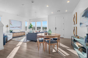 907 West Bright Ridge Ln Street, Unit 1430 St. George, UT 84790 - Photo 3 of 19 Open-concept interior featuring light wood-finish flooring and recessed lighting throughout