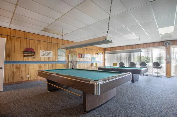a view of a swimming pool with a terrace