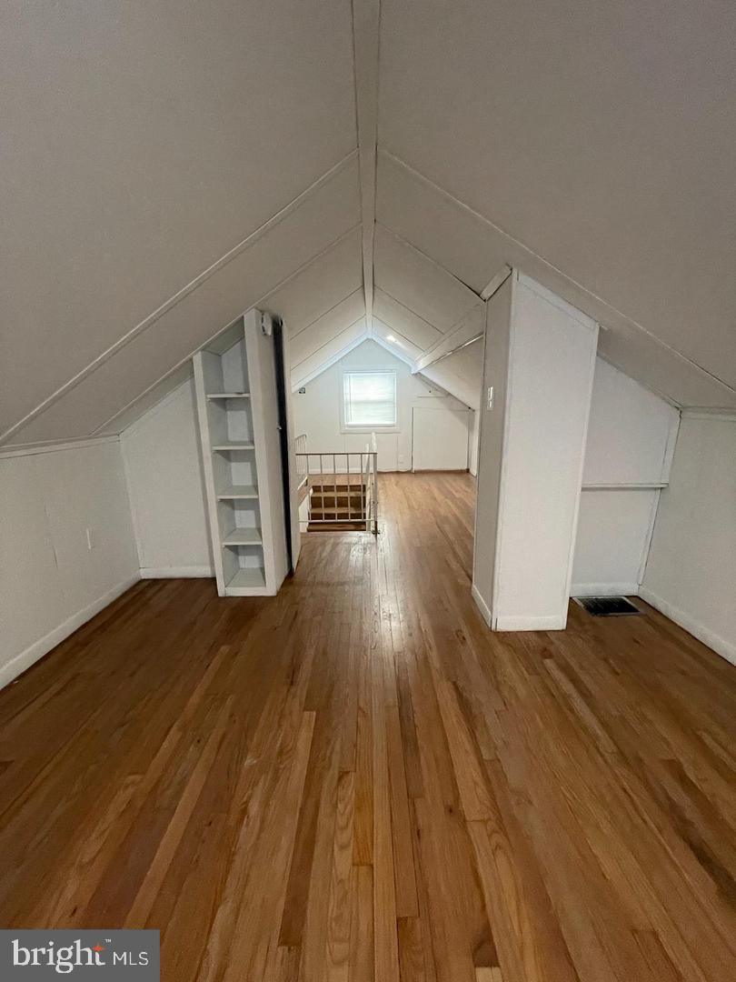 105 Breslin Avenue Haddonfield, NJ 08033 - Photo 13 of 15 a view of empty room with wooden floor