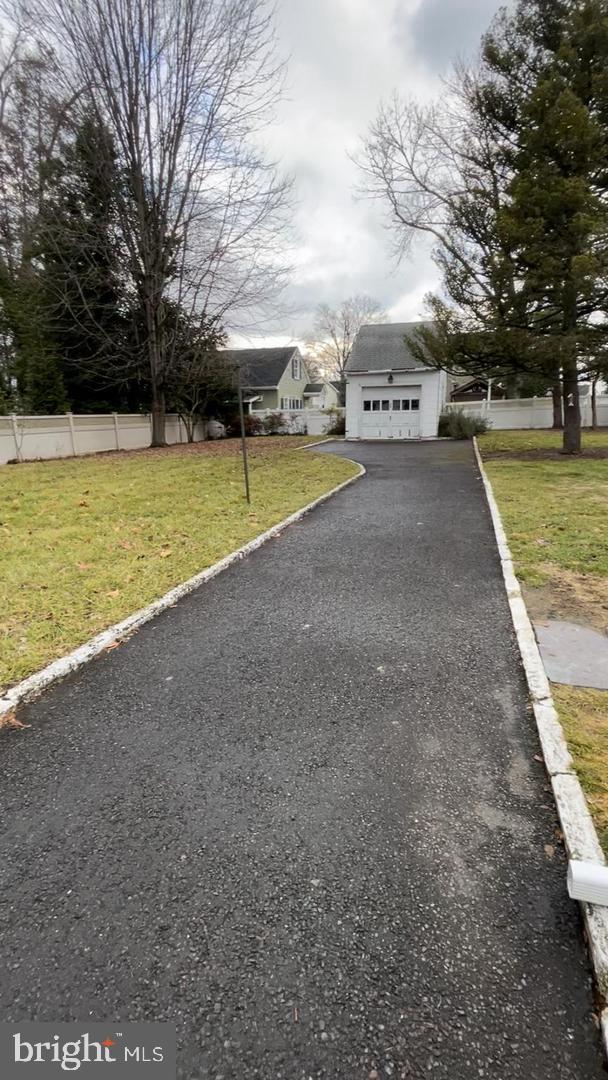 105 Breslin Avenue Haddonfield, NJ 08033 - Photo 2 of 15 a view of a house with swimming pool and sitting area