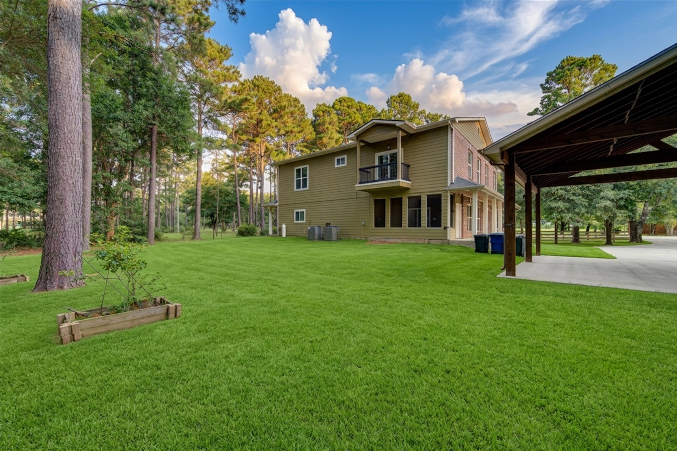 20531 Faye Tomball, TX 77377 - Photo 40 of 43 a front view of a house with a garden and trees