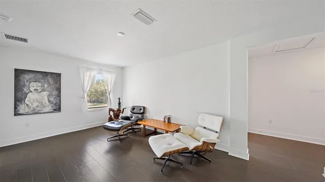 a bedroom with a bed and a closet