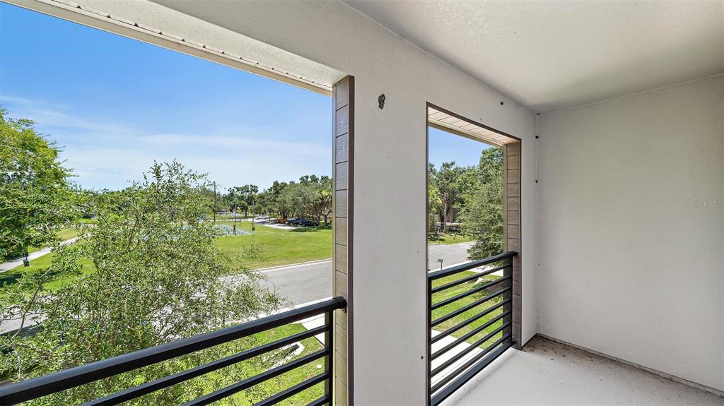 2587 Temple Street Sarasota, FL 34239 - Photo 30 of 54 a view of a balcony with lake view