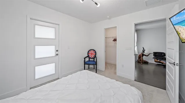 an aerial view of a house with a garden