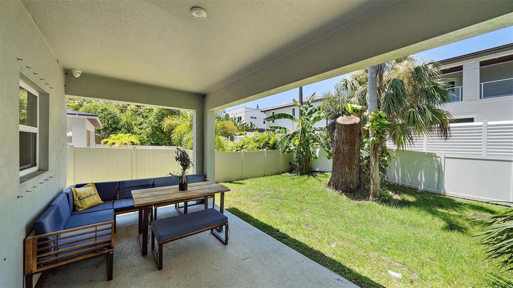 2587 Temple Street Sarasota, FL 34239 - Photo 44 of 54 a outdoor living space with furniture and a potted plant
