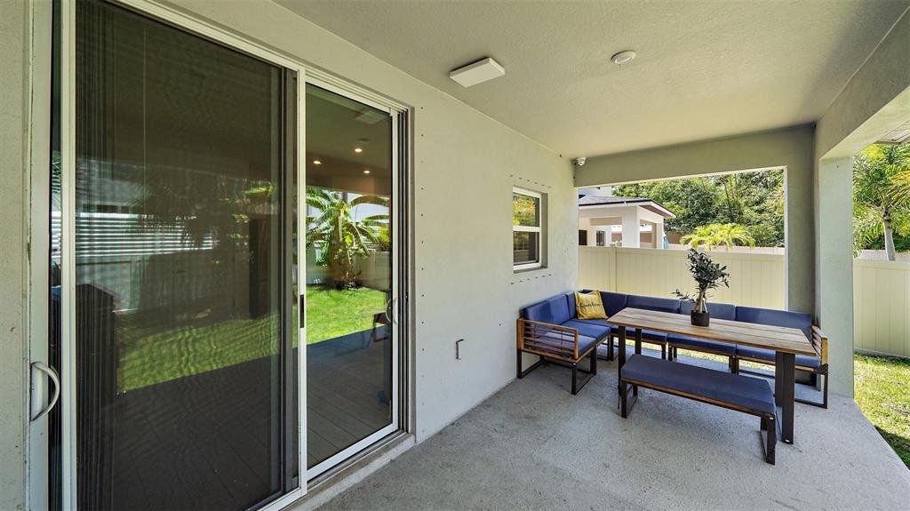 2587 Temple Street Sarasota, FL 34239 - Photo 46 of 54 a living room with furniture and a window