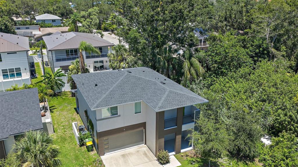 2587 Temple Street Sarasota, FL 34239 - Photo 48 of 54 an aerial view of a house with a yard
