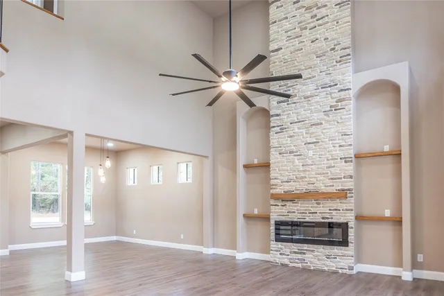 a kitchen with stainless steel appliances granite countertop a stove and a refrigerator