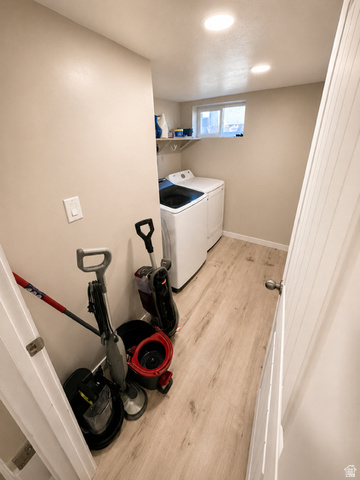 303 North Main Street Grace, ID 83241 - Photo 22 of 22 Dedicated laundry area featuring light wood-finish flooring, recessed lighting, and a window